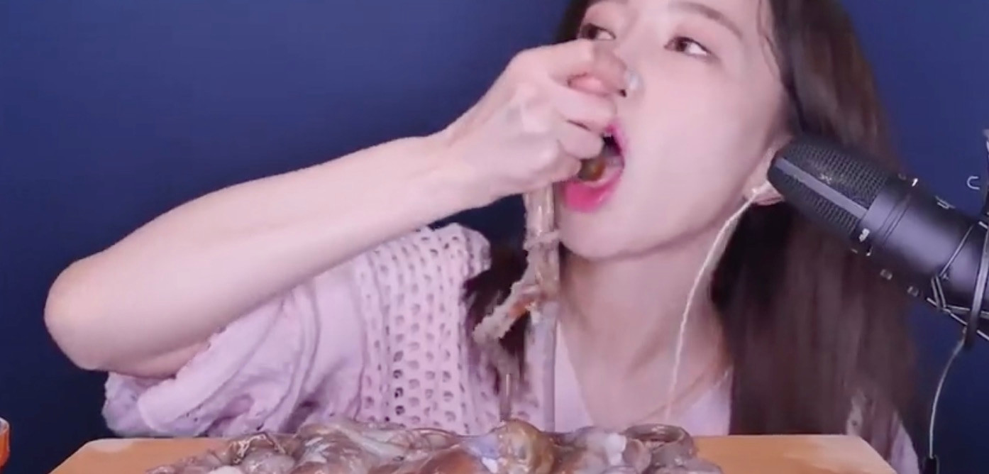  Ssoyoung is seen eating a live octopus in one video