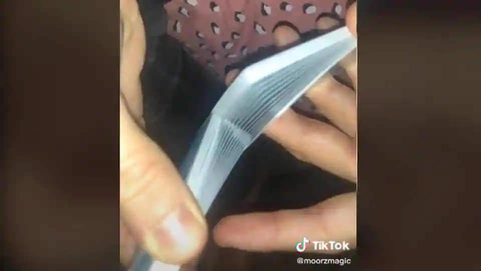 This video posted by TikTok user @moorzmagic shows him masterfully performing a Faro Shuffle.