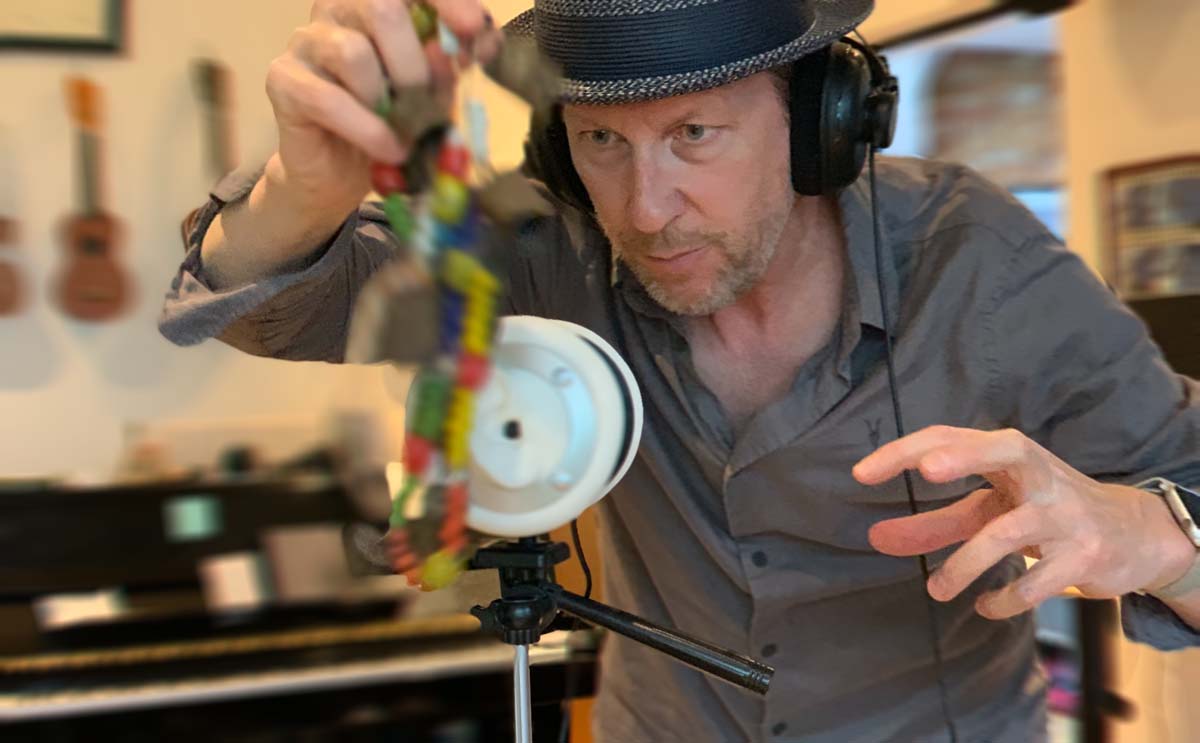 Rolfe Kent works on recording sounds for his 360 audio journeys. | Courtesy of Rolfe Kent